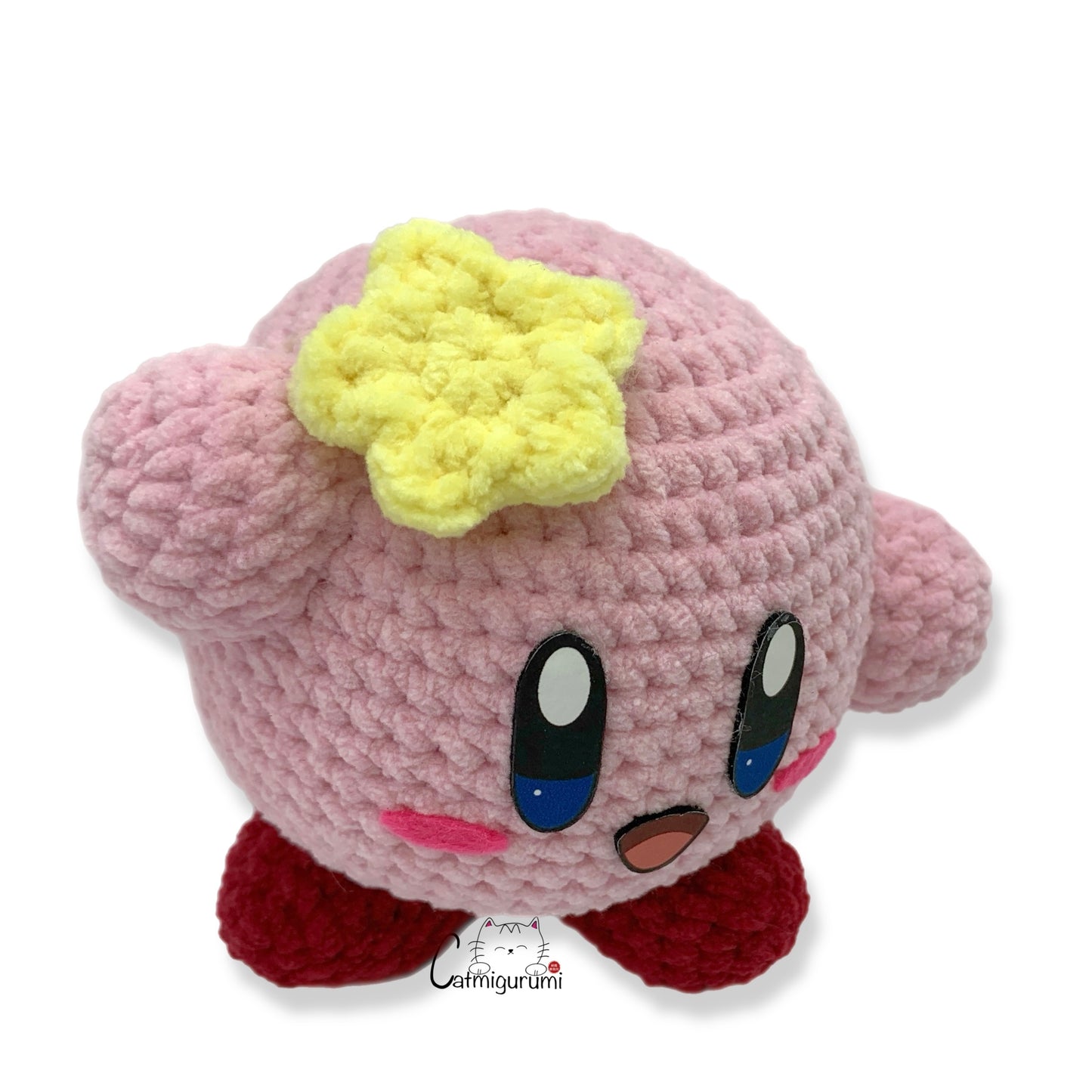 Pink Puffball felt facial features used on handmade amigurumi plush toy top
