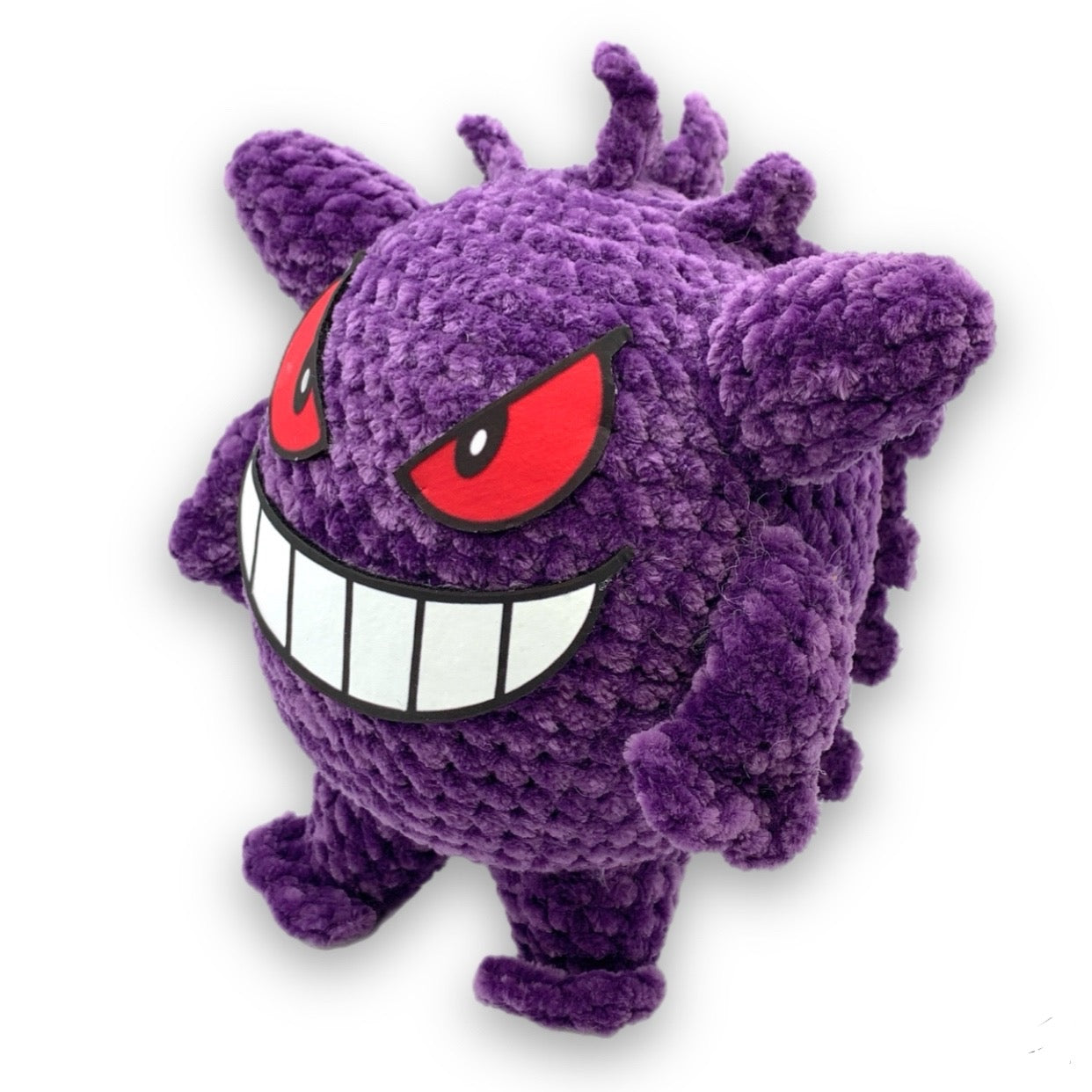 Side details of Gengar amigurumi crochet plush