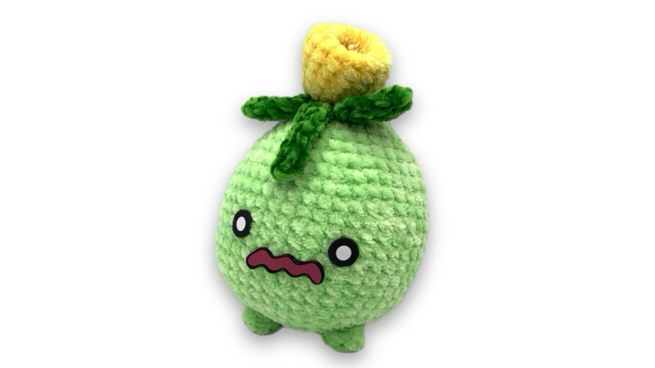 small  Smoliv plush made using the free crochet pattern