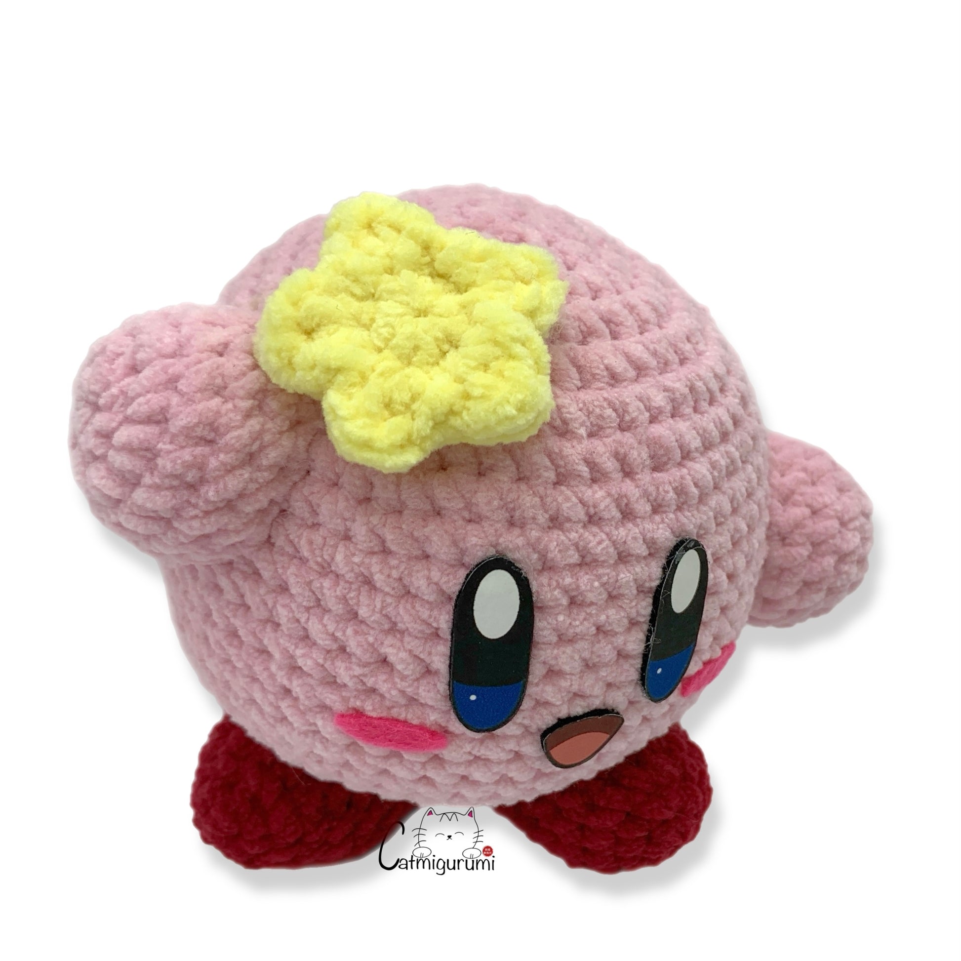 Pink Puffball felt facial features used on handmade amigurumi plush toy top