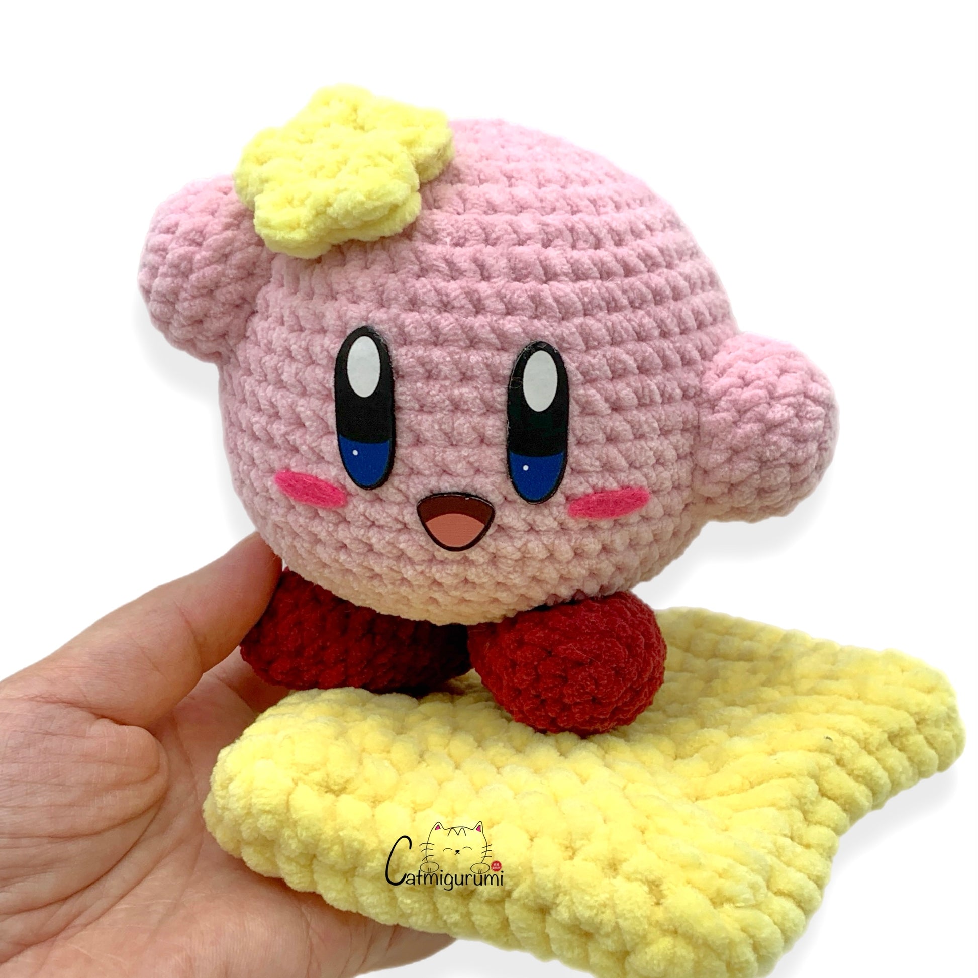 Pink Puffball felt facial features used on handmade amigurumi plush toy