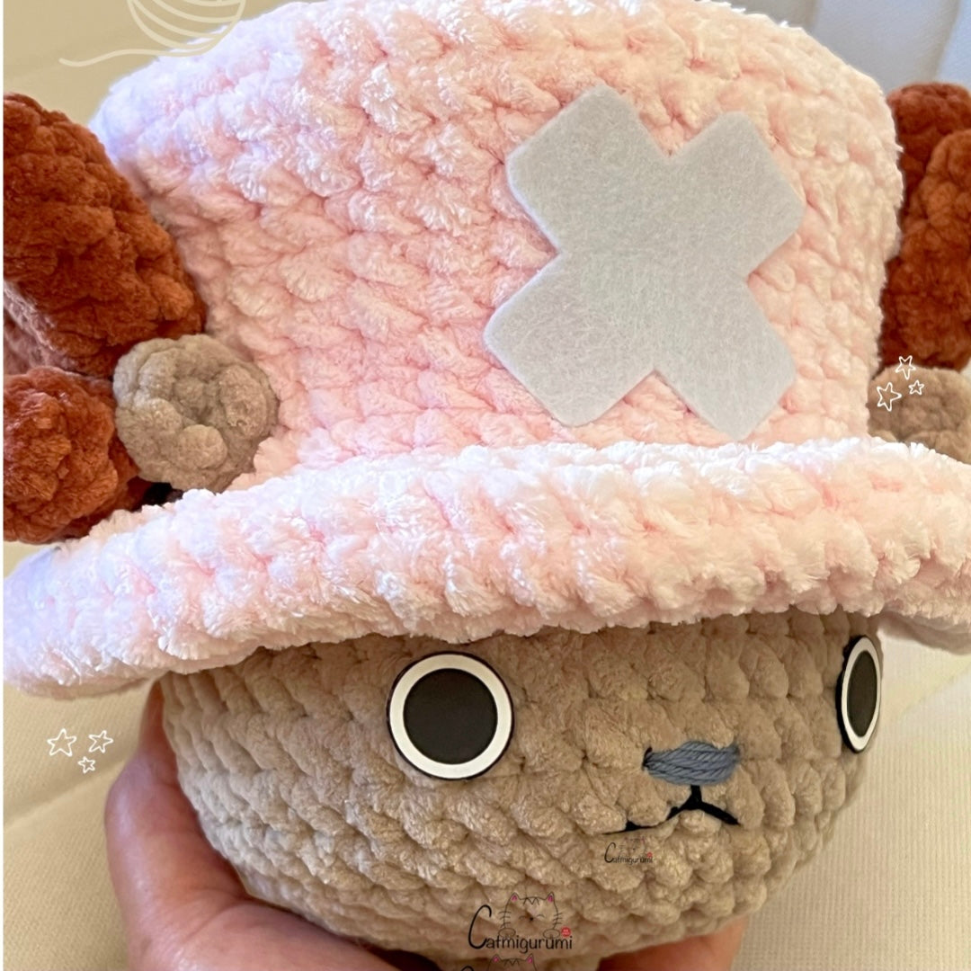 detail view of reindeer doctor amigurumi plush