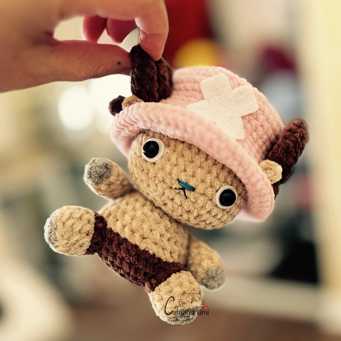 side view of reindeer doctor crochet plush toy