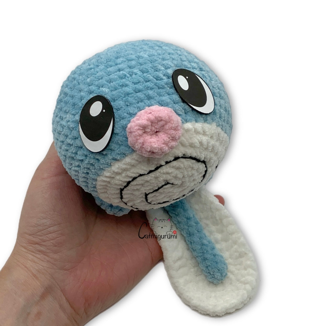 Swirly Tadpole felt eyes used on handmade amigurumi plush toy Front