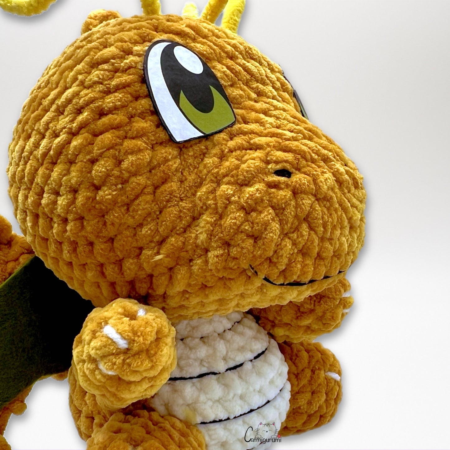 Detail view of flying yellow dragon amigurumi plush crochet pattern